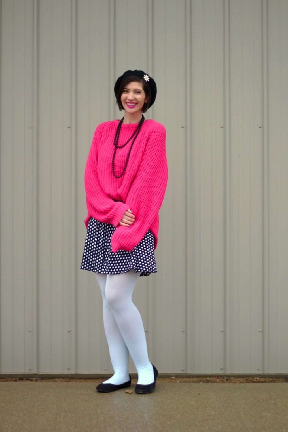Oversized pink sweater, vintage beaded necklace, black beret, daisy pin, polka dot skirt, mint blue tights, black flats