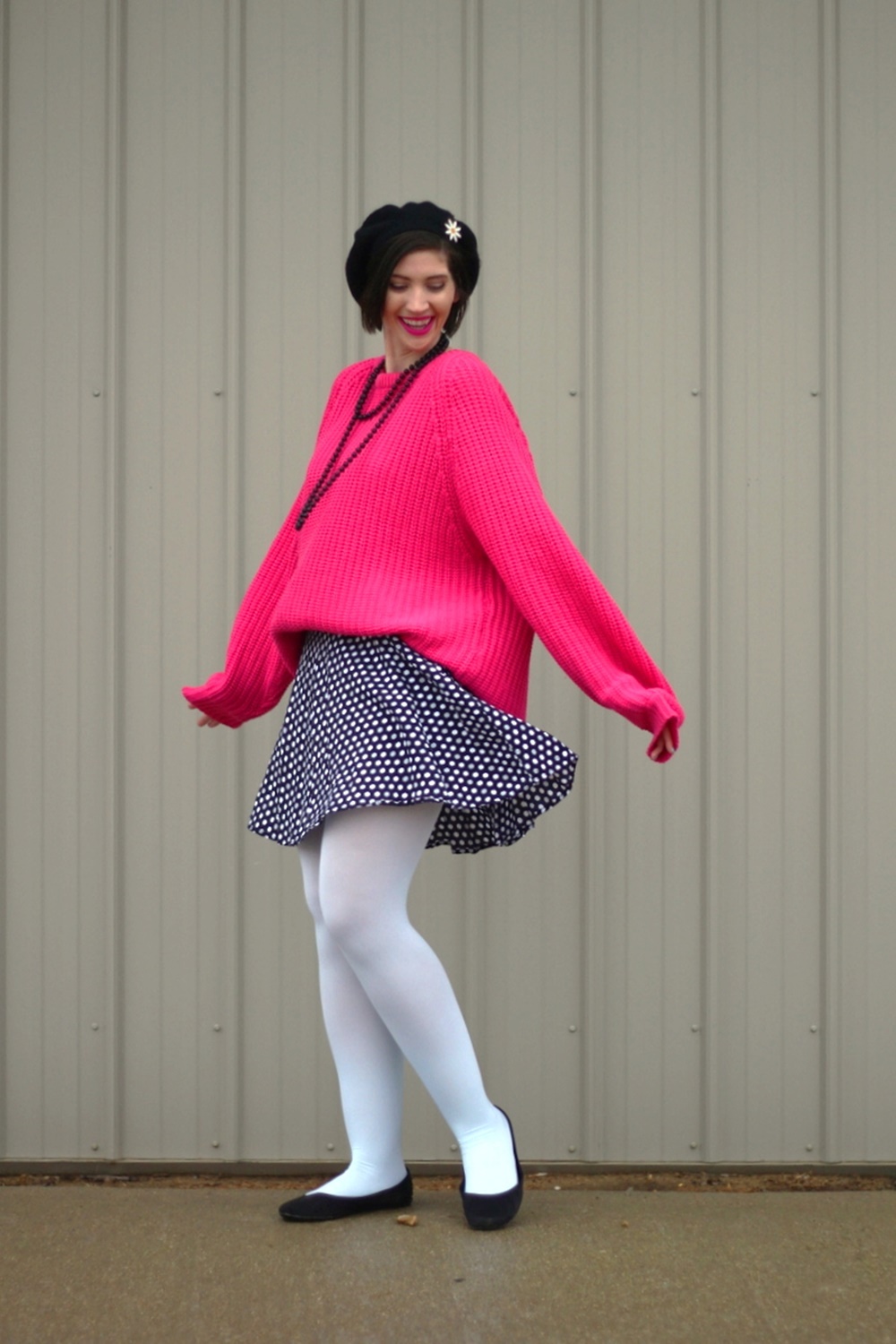 Oversized pink sweater, vintage beaded necklace, black beret, daisy pin, polka dot skirt, mint blue tights, black flats