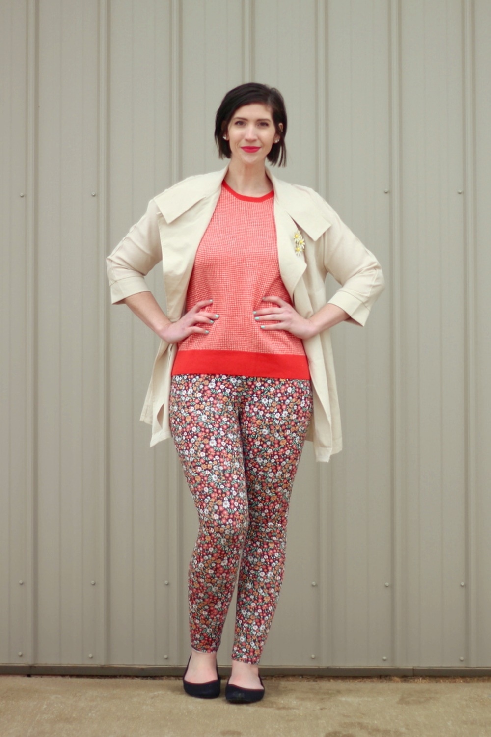 pattern mixing, orange sweater, floral pants, 1980s trench coat, vintage style, outfit