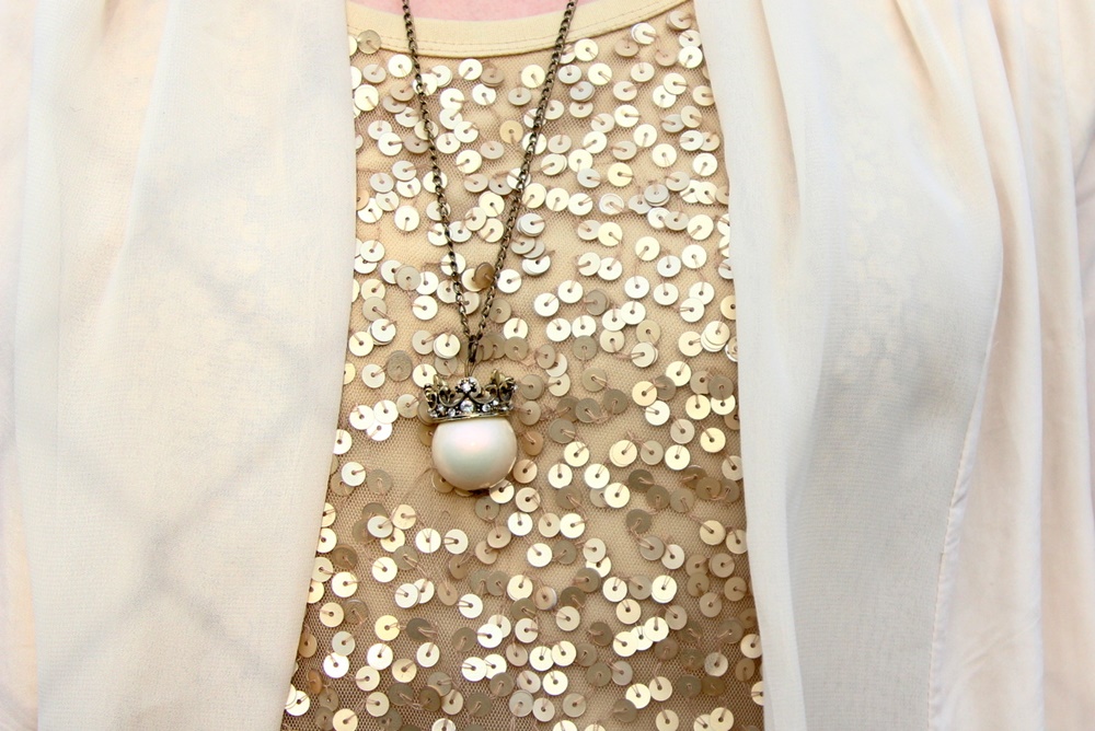 Gold sequin t-shirt, cream color cover-up, crown necklace, gold leaf headband, thrifted maroon jeggings, ThredUp nude flats