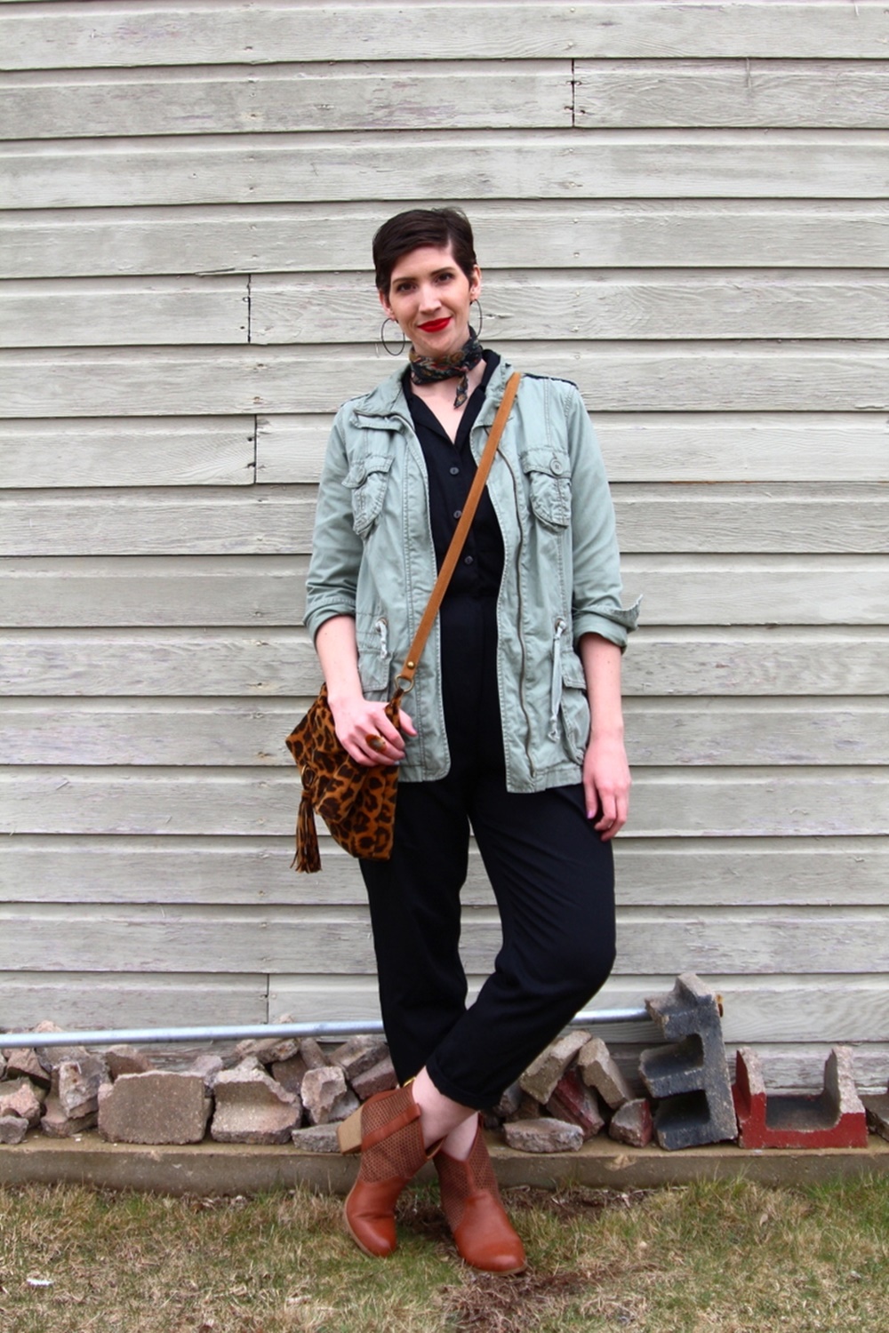 vintage black jumpsuit fashion jungle red lipstick leopard print purse neckerchief scarf olive green jacket thrifted brown booties