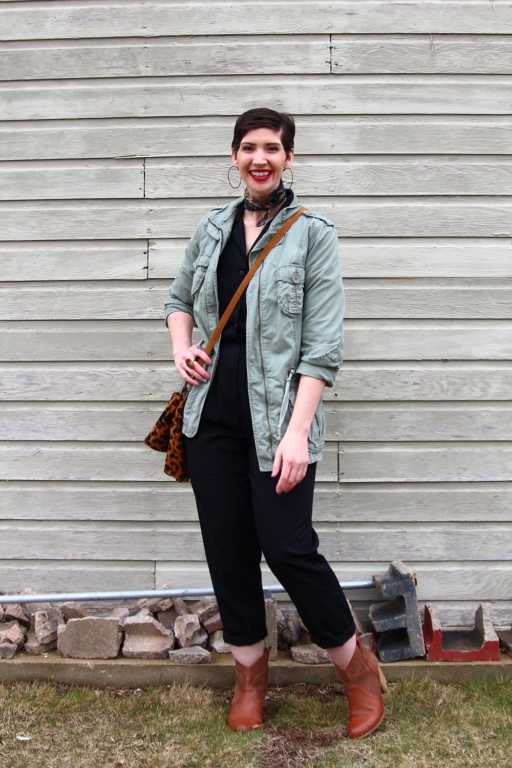 Looking Anything But Outdated In a Vintage Jumpsuit | theoutfitrepeater.com vintage black jumpsuit fashion jungle red lipstick leopard print purse neckerchief scarf olive green jacket thrifted brown booties