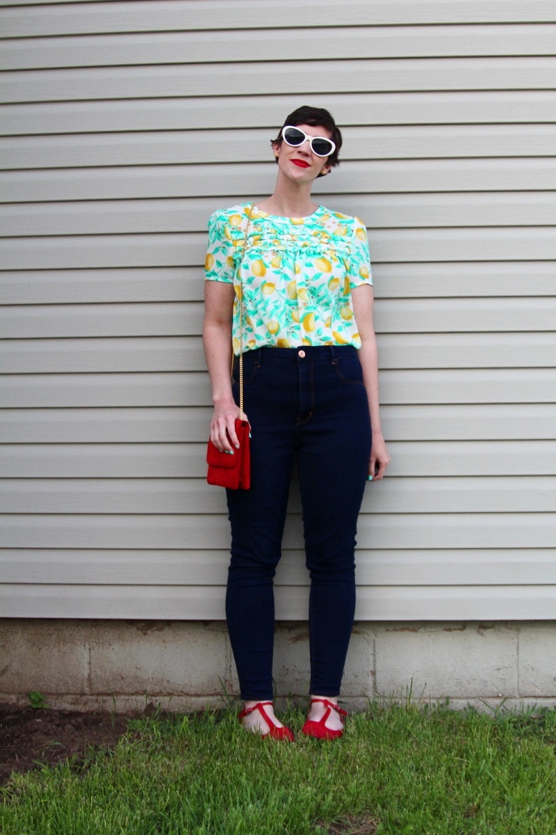 outfit Lemon print blouse, high waisted jeans, red flats, MAC Ruby Woo lipstick, curly pixie haircut, red purse