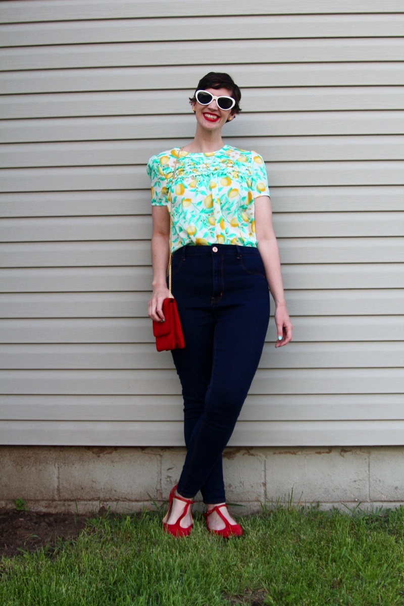 outfit Lemon print blouse, high waisted jeans, red flats, MAC Ruby Woo lipstick, curly pixie haircut, red purse