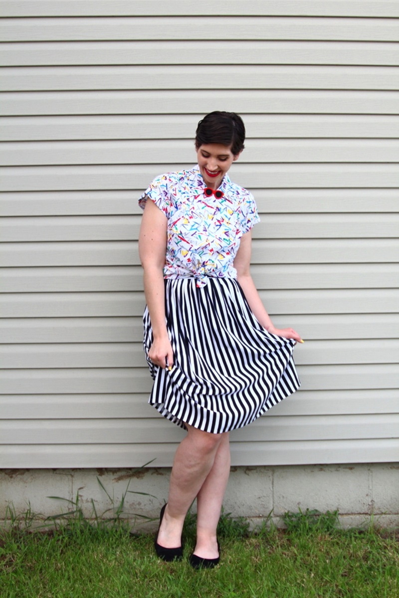 Memorial day outfit, thrifted black and white striped skirt, vintage abstract printed button up, Colourpop lippie stix Bossy red, black Walmart flats, 1980s sunglasses lapel pin