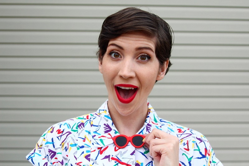 Memorial day outfit, thrifted black and white striped skirt, vintage abstract printed button up, Colourpop lippie stix Bossy red, black Walmart flats, 1980s sunglasses lapel pin