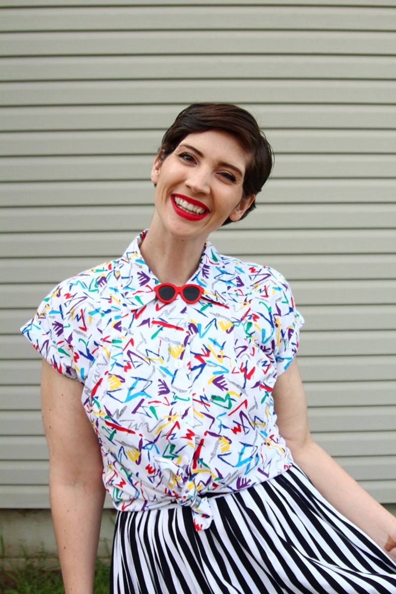Memorial day outfit, thrifted black and white striped skirt, vintage abstract printed button up, Colourpop lippie stix Bossy red, black Walmart flats, 1980s sunglasses lapel pin