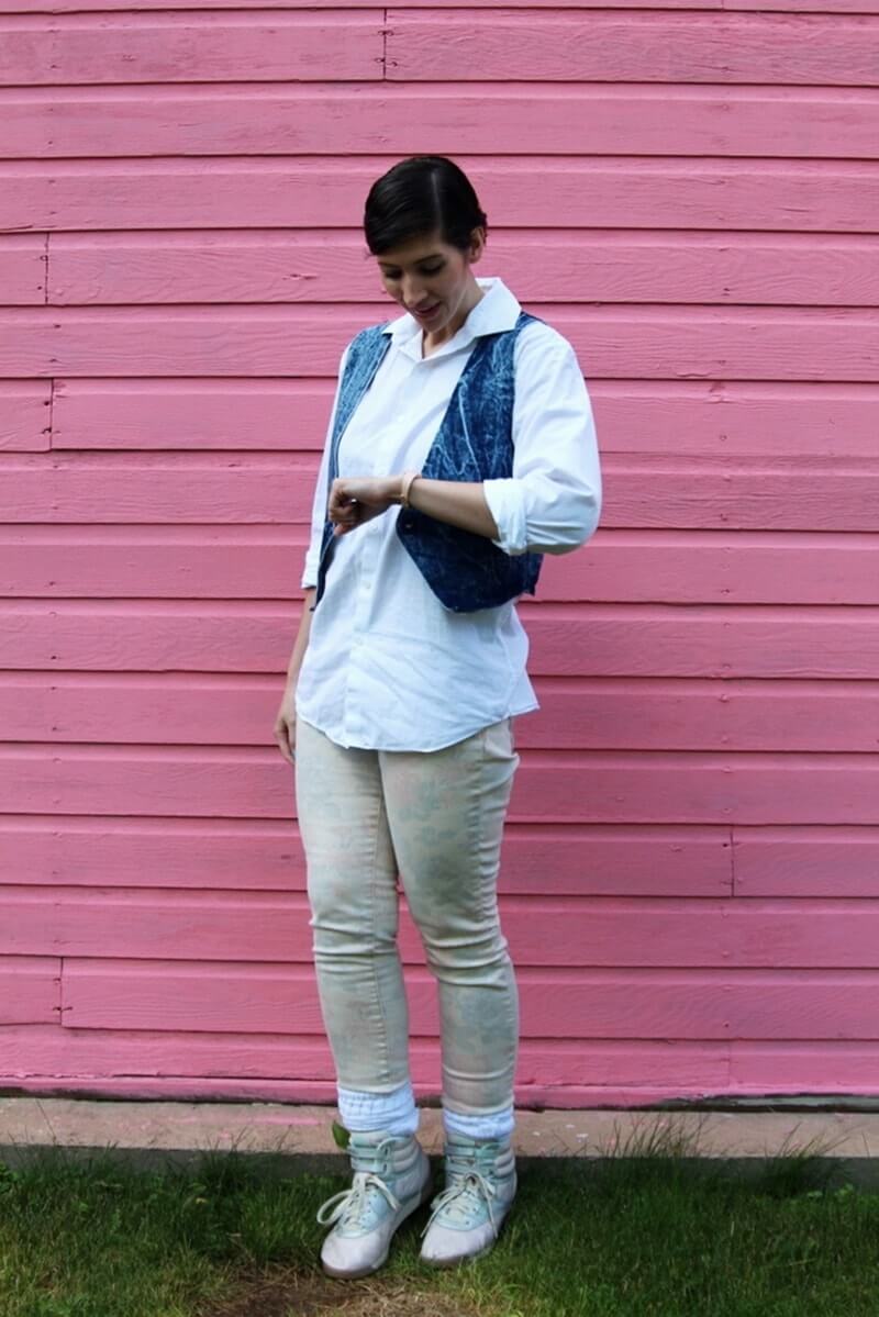 A Completely Thrifted Back To The Future Inspired Outfit | theoutfitrepeater.com Back to the future costume, Jennifer Parker inspired look, white button down, denim vest, pink floral jeans, Reebok high top sneakers, white scrunched socks, pink Swatch watch