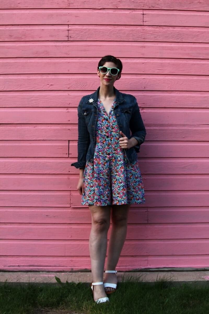 Floral romper, thrifted denim jacket, flower enamel pin, white Lulus sandals, sea foam green sunglasses, Colourpop lippie stix Heart On