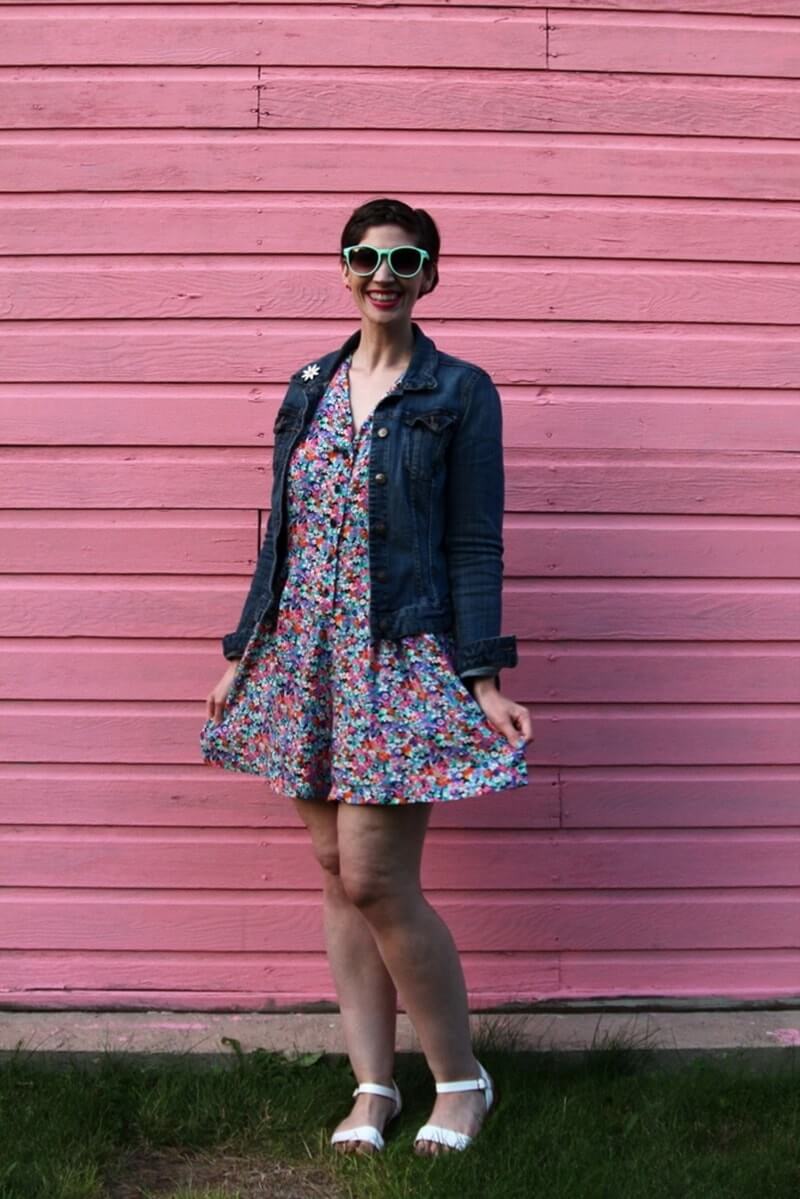 Floral romper, thrifted denim jacket, flower enamel pin, white Lulus sandals, sea foam green sunglasses, Colourpop lippie stix Heart On