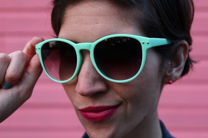 Floral romper, thrifted denim jacket, flower enamel pin, white Lulus sandals, sea foam green sunglasses, Colourpop lippie stix Heart On
