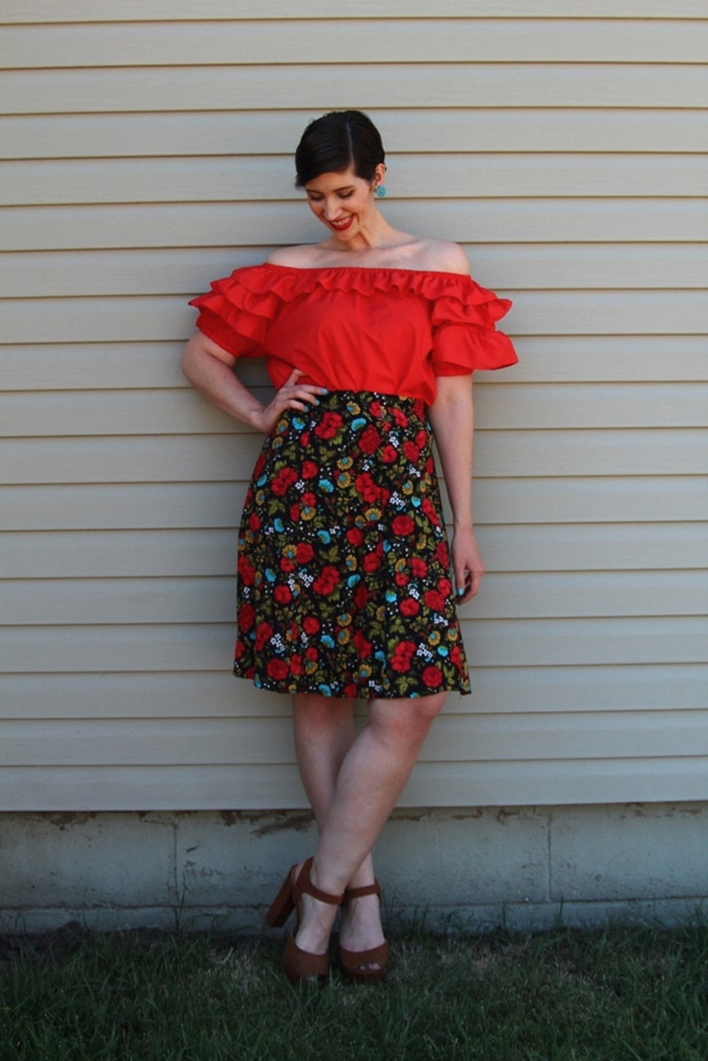 the outfit repeater hannah rupp fashion blog red off the shoulder blouse, floral skirt, thredup platform high heels, vintage blue flower clip on earrings, colourpop lippie stix bossy