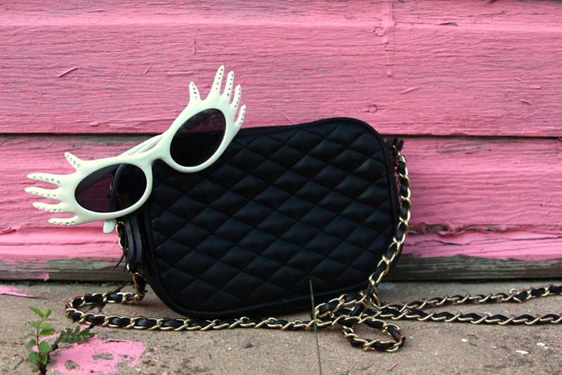 80s style floral prom dress, footless tights, pink belt, gingham jacket, pork pie hat, doorknocker earrings, quilted purse, white sunglasses, socks with heels