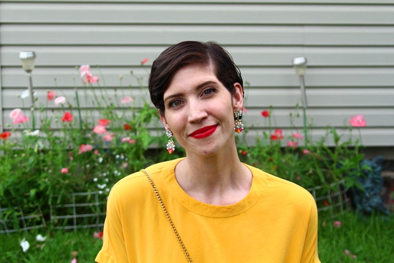 Going Outside My Comfort Zone in Floral Shorts + How You Can Do It Too | theoutfitrepeater.com outfit detail floral shorts summer, yellow blouse, red purse, colourpop bossy lippie stix, pixie hair cut, lulus white sandals