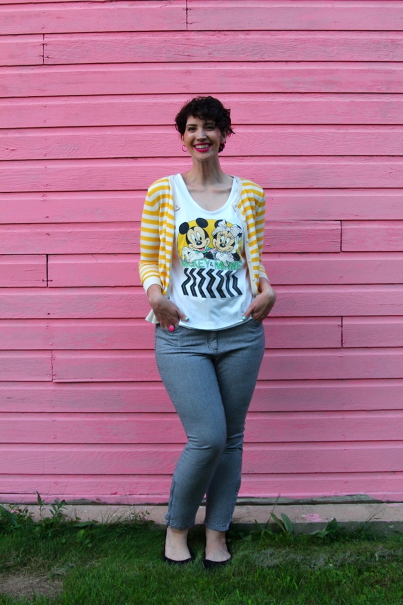 how to style houndstooth pants outfit unexpected pattern mixing yellow striped H&M cardigan, vintage minnie and mickey mouse graphic tshirt, curly hair, YSL fuchsia lipstick, black walmart flats