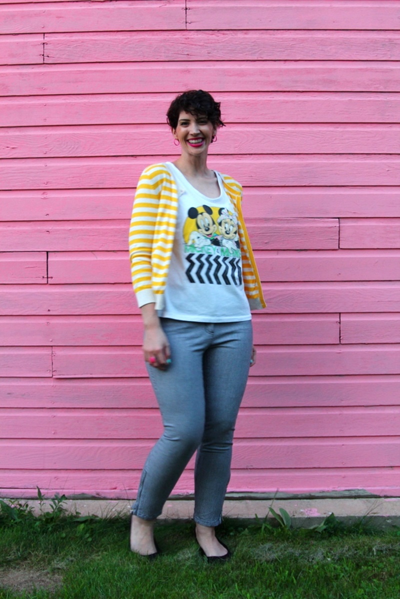 how to style houndstooth pants outfit unexpected pattern mixing yellow striped H&M cardigan, vintage minnie and mickey mouse graphic tshirt, curly hair, YSL fuchsia lipstick, black walmart flats