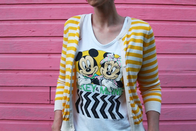 how to style houndstooth pants outfit unexpected pattern mixing yellow striped H&M cardigan, vintage minnie and mickey mouse graphic tshirt, curly hair, YSL fuchsia lipstick, black walmart flats