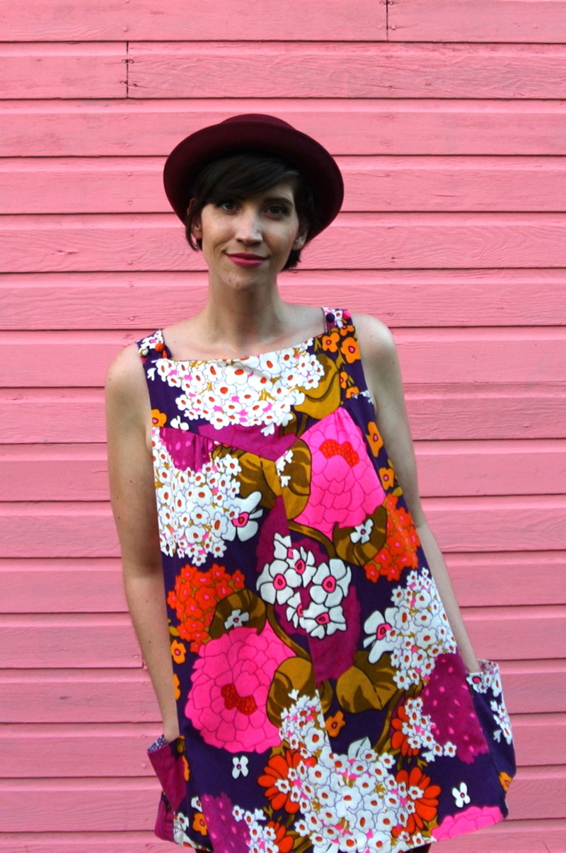 floral for fall outfit post vintage floral shift dress, maroon jeggings, purple bowler hat, nude t-strap high heels