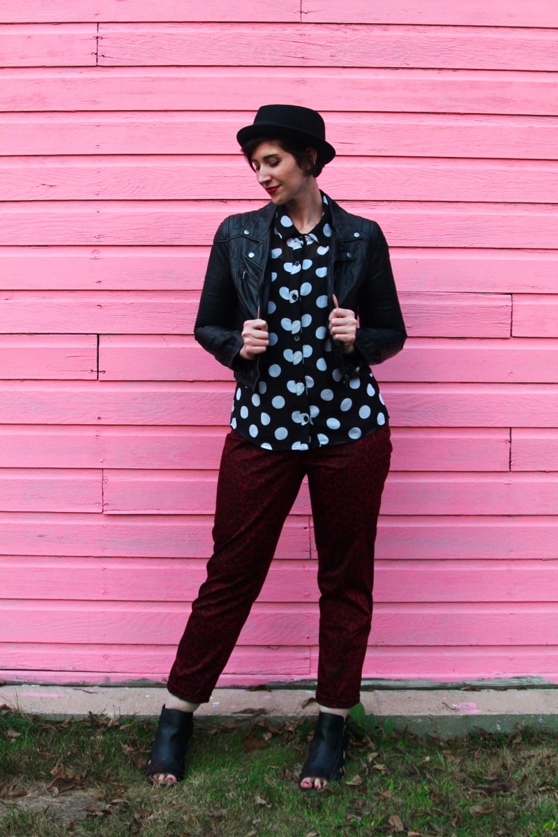 the outfit repeater hannah rupp, thrifted polka dot button up, thredUP red leopard print pants, H&M leather jacket, seven dials shoes black cutout booties, asos pork pie hat, colourpop lippie stix lbb