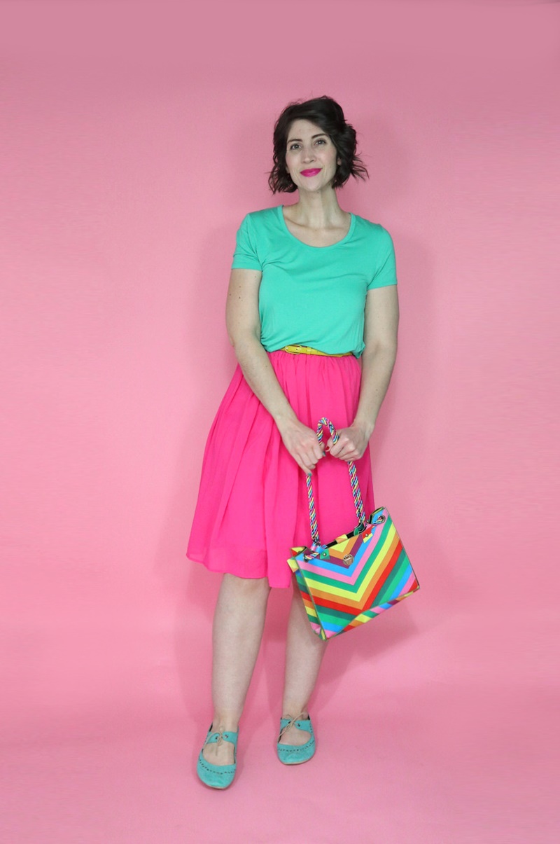 best thrifted clothes outfit teal tee pink skirt rainbow purse