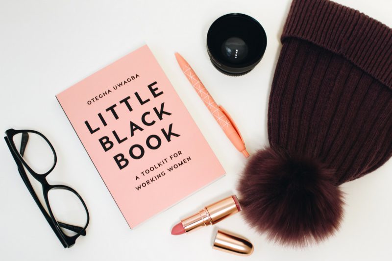 7 Inspiring Ways To Get Dressed When You Don't Know What To Wear | www.theoutfitrepeater.com stock image of fashion book, eyeglasses, lipstick, camera lens, and a winter hat
