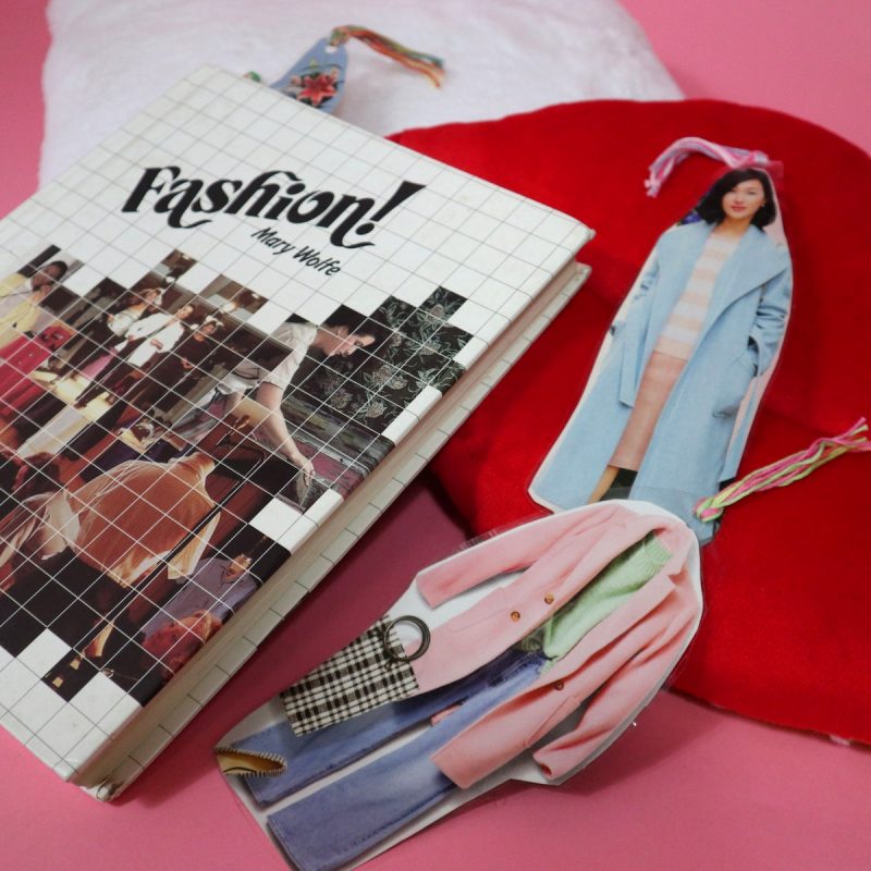 a fashion book and bookmarks made out of upcycled fashion magazines