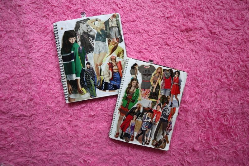 outfit inspiration notebooks on a furry pink rug