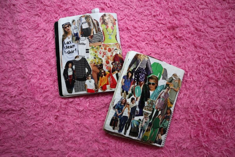 outfit inspiration notebooks on a furry pink rug
