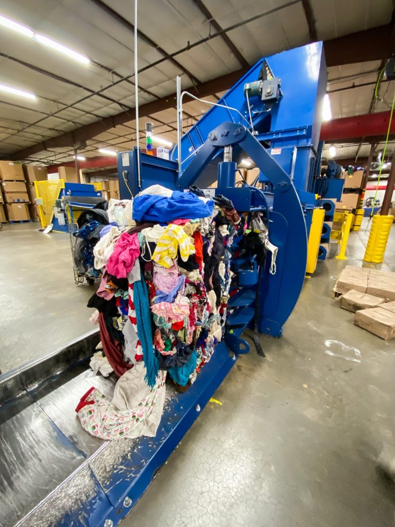 goodwill baler full of textiles to be recycled