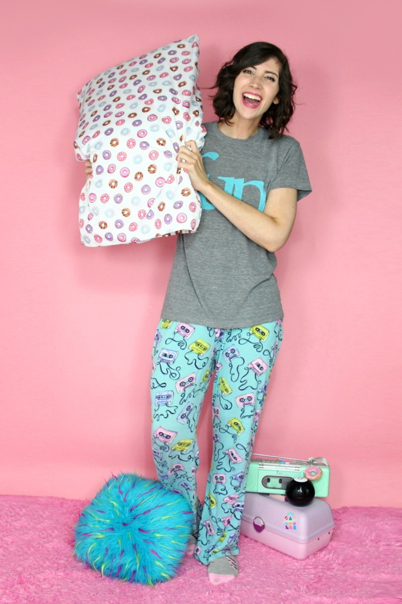 10 Essential Outfits You Should Always Have In Your Closet | theoutfitrepeater.com White female laughing while wearing pajamas - gray t-shirt and patterned pants