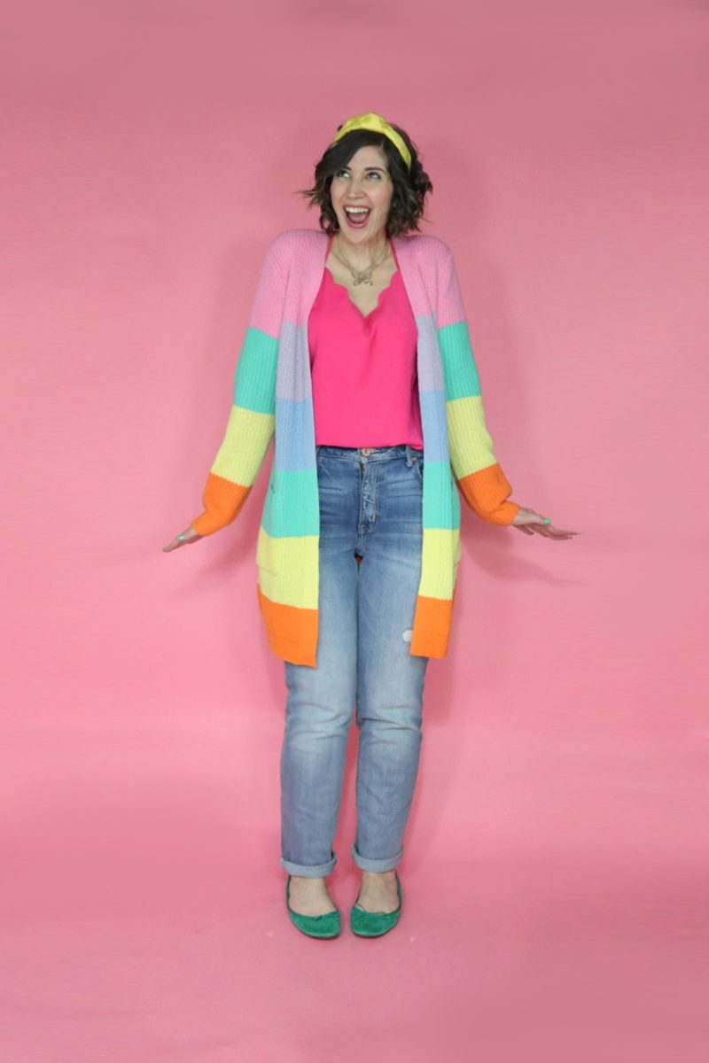 10 Essential Outfits You Should Always Have In Your Closet | theoutfitrepeater.com White female with short brown hair wearing a pink tank top or rainbow-striped cardigan jeans and a yellow headband