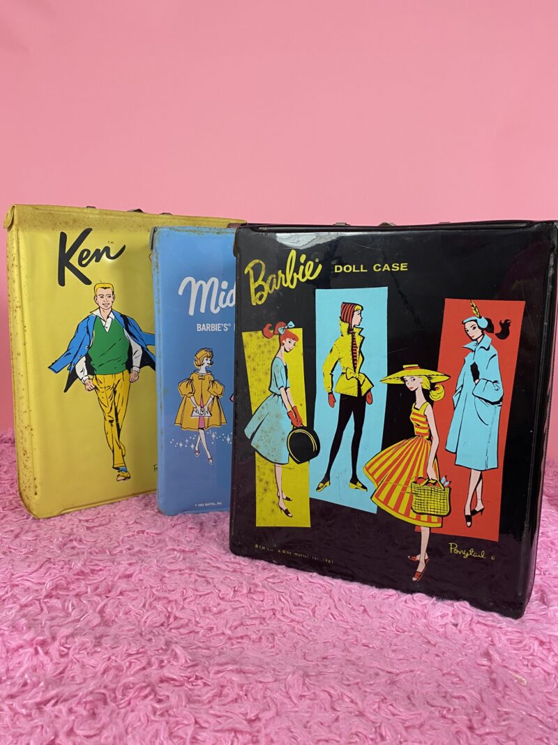 How I Saved Vintage Barbie Dolls from the Trash | www.theoutfitrepeater.com a pink background with three vintage Barbie doll cases from the 1960s